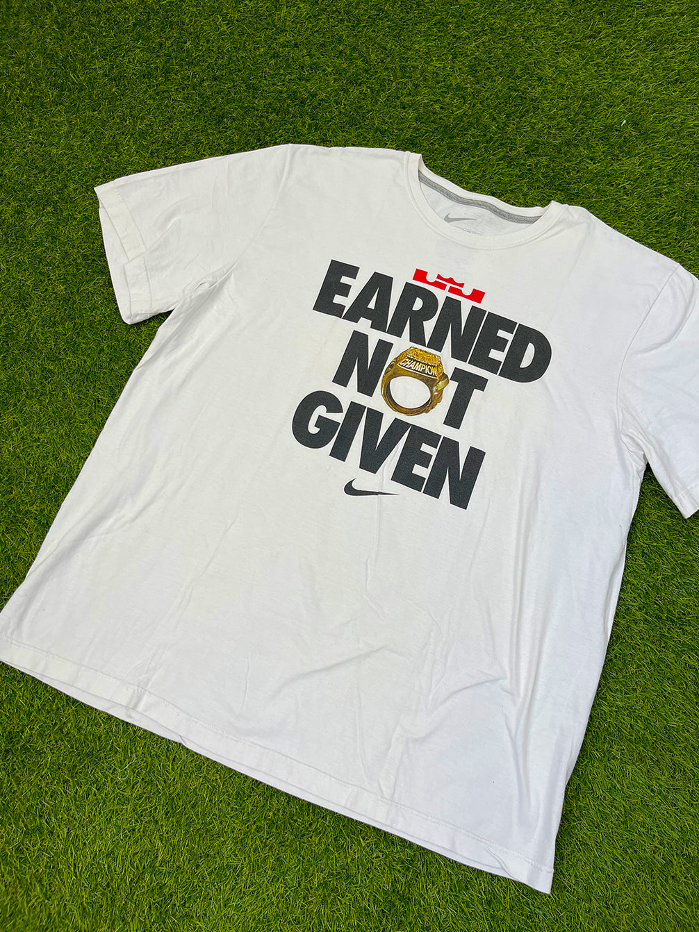 'EARNED NOT GIVEN' NIKE T-SHIRT